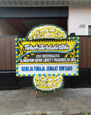 Papan Bunga Duka di Kota Bambu Utara